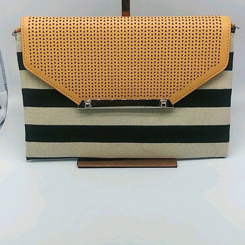 Stella & Dot tan and black and white wristlet